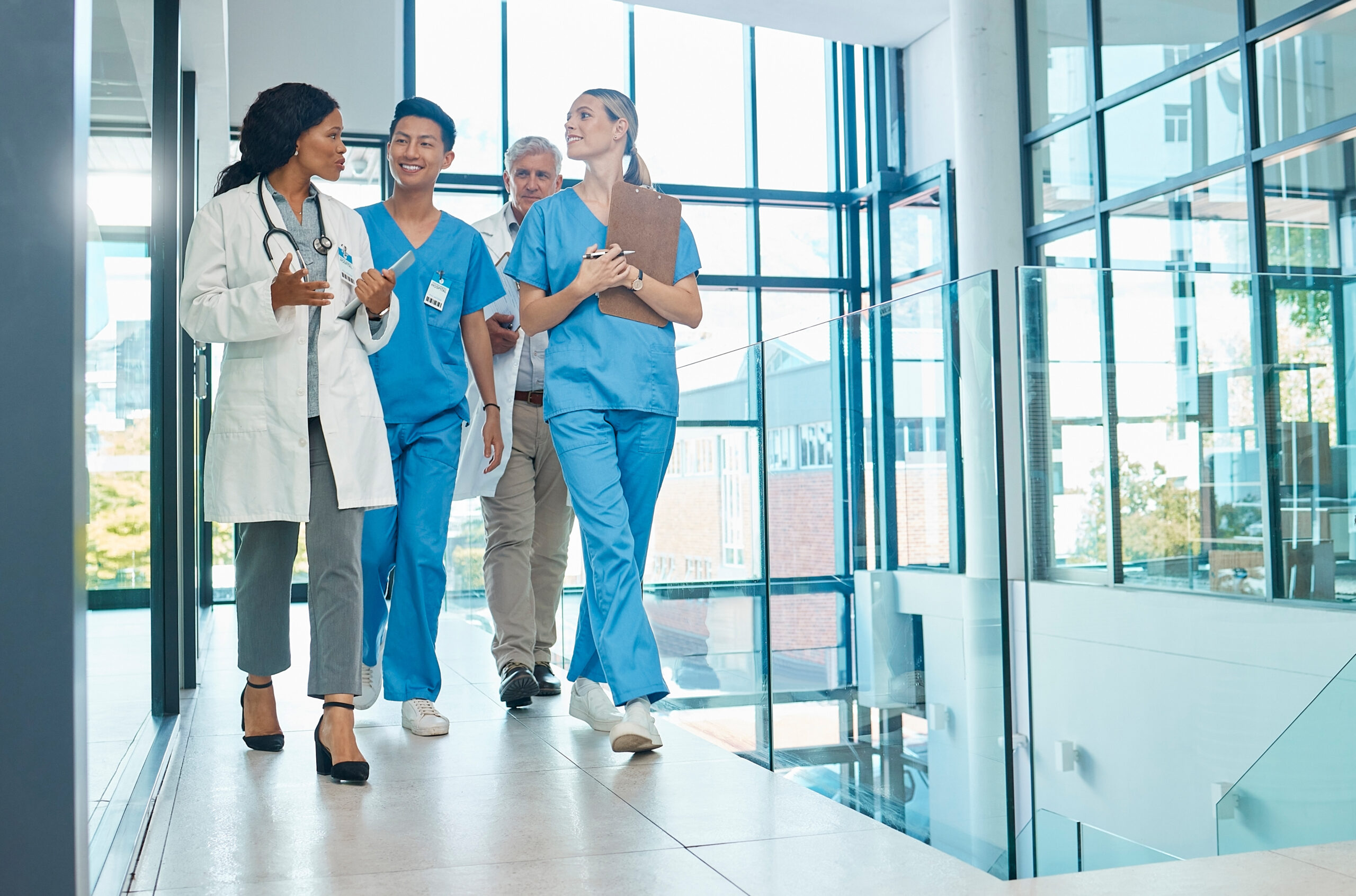 Doctors and nurses walking together